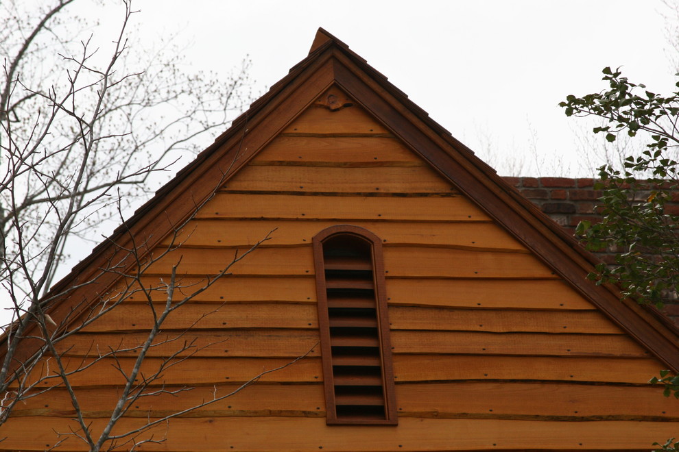 Juniper live edge siding Traditional Exterior Richmond by E. T