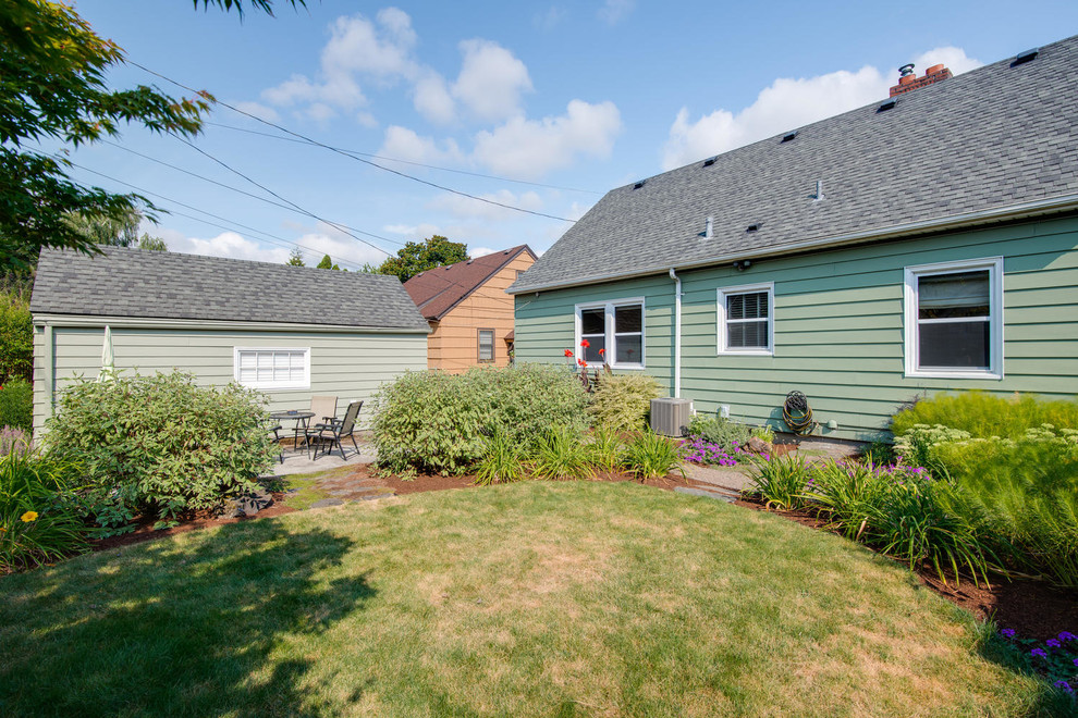 Example of an eclectic exterior home design in Portland