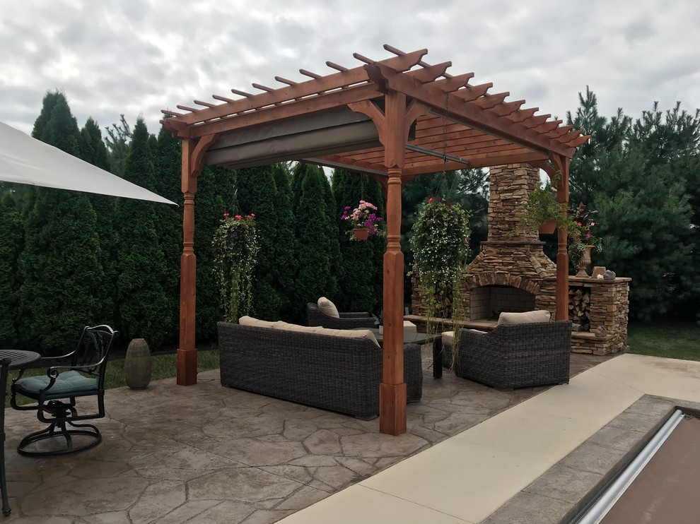 Kansas Paver Patio with Pergola, Fireplace, Outdoor Kitchen, and Pool