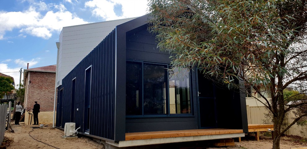 Inspiration for a contemporary two floor detached house in Perth with metal cladding.