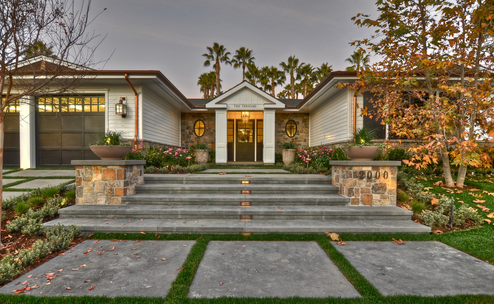 Photo of a traditional bungalow house exterior in Orange County with mixed cladding.