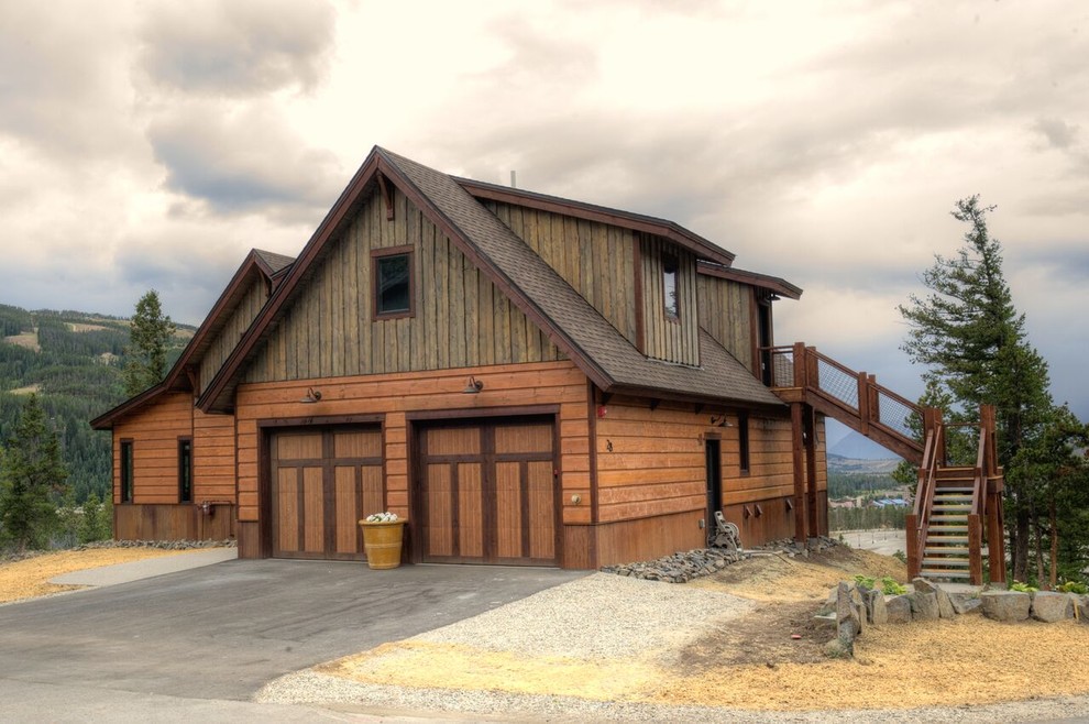 Mid-sized rustic gray split-level mixed siding exterior home idea in Denver with a shingle roof