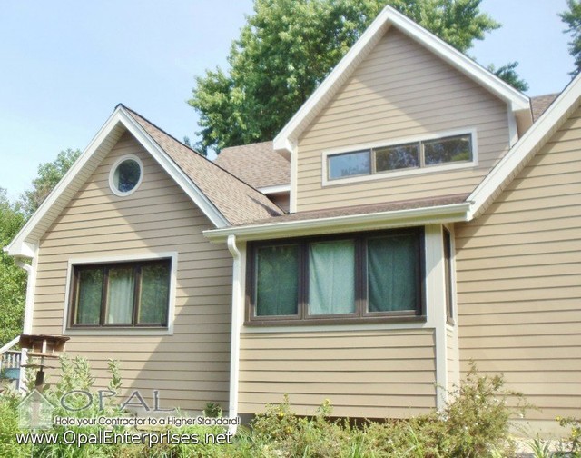 Khaki Brown James Hardie Siding with Matching Trim, Soffit, & Gutters