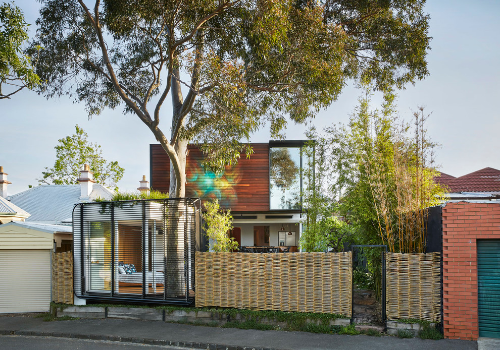 Small contemporary house exterior idea in Melbourne