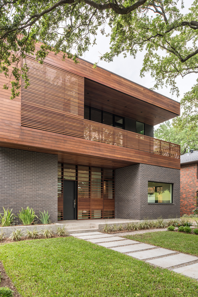 Réalisation d'une façade de maison design.