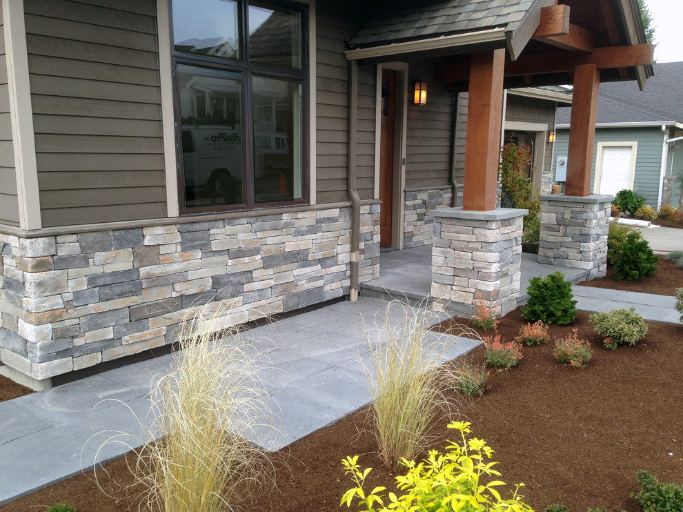 Inspiration for a craftsman stone exterior home remodel in Seattle