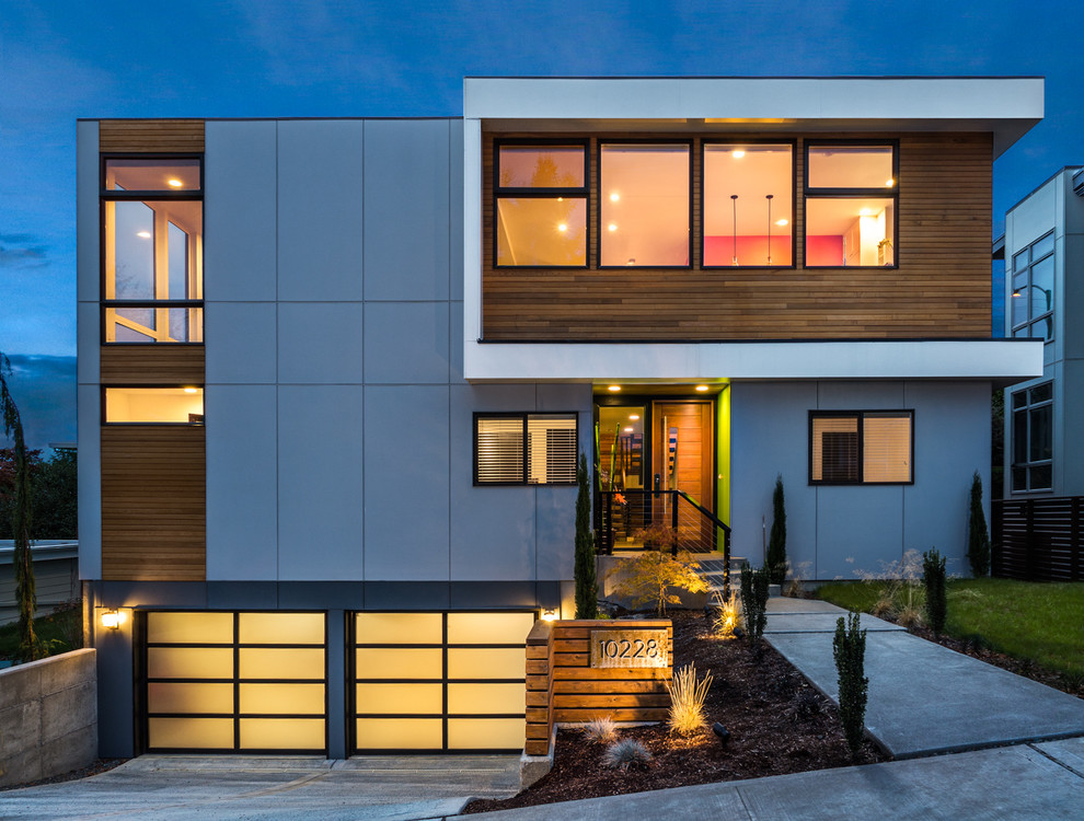 Design ideas for a gey contemporary house exterior in Seattle with mixed cladding.