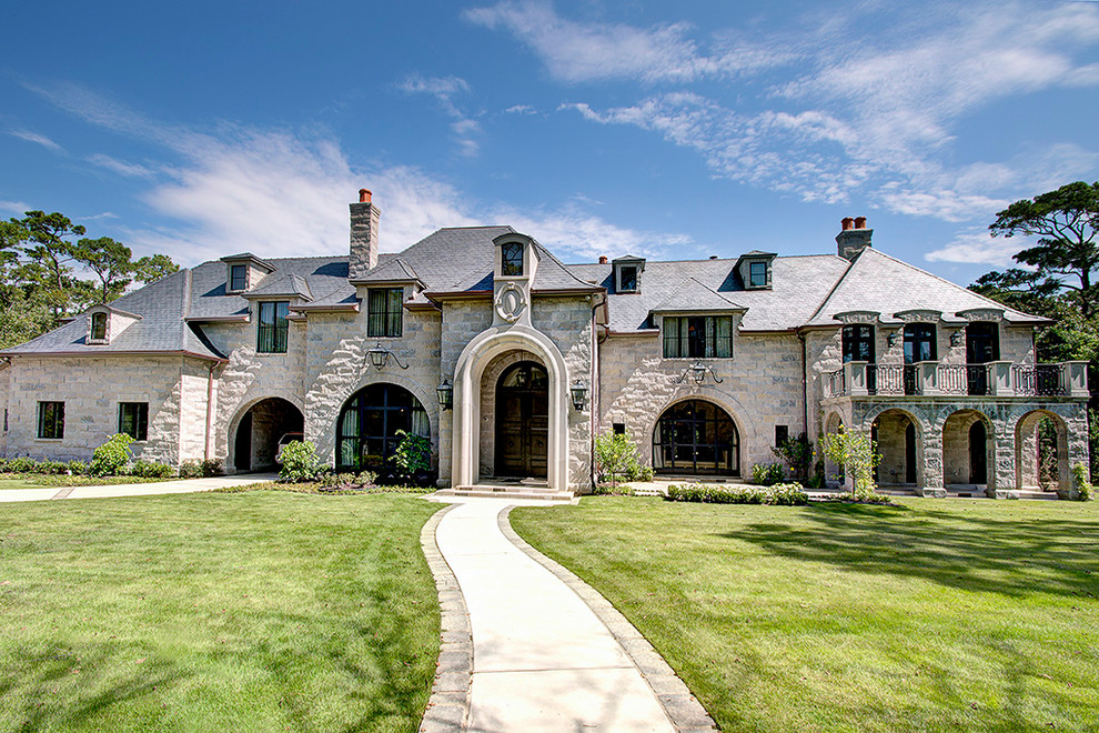 Photo of a classic two floor house exterior in Houston with stone cladding.