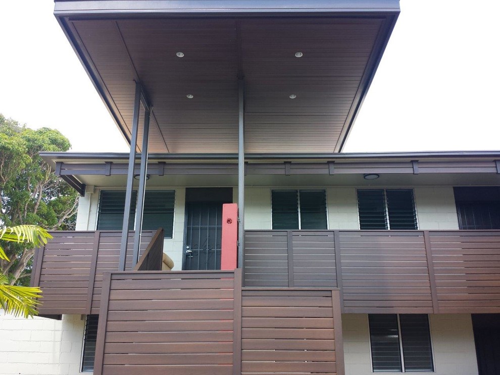 Example of a beach style exterior home design in Brisbane