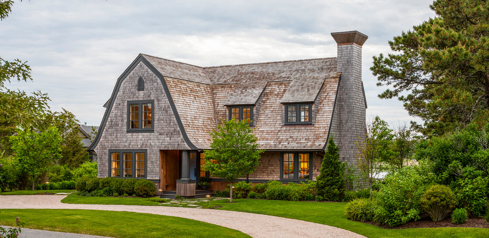 Victorian two-story wood exterior home idea in Boston with a gambrel roof