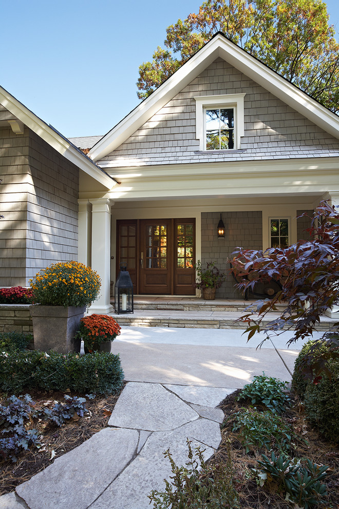 Inspiration for a timeless wood exterior home remodel in Minneapolis