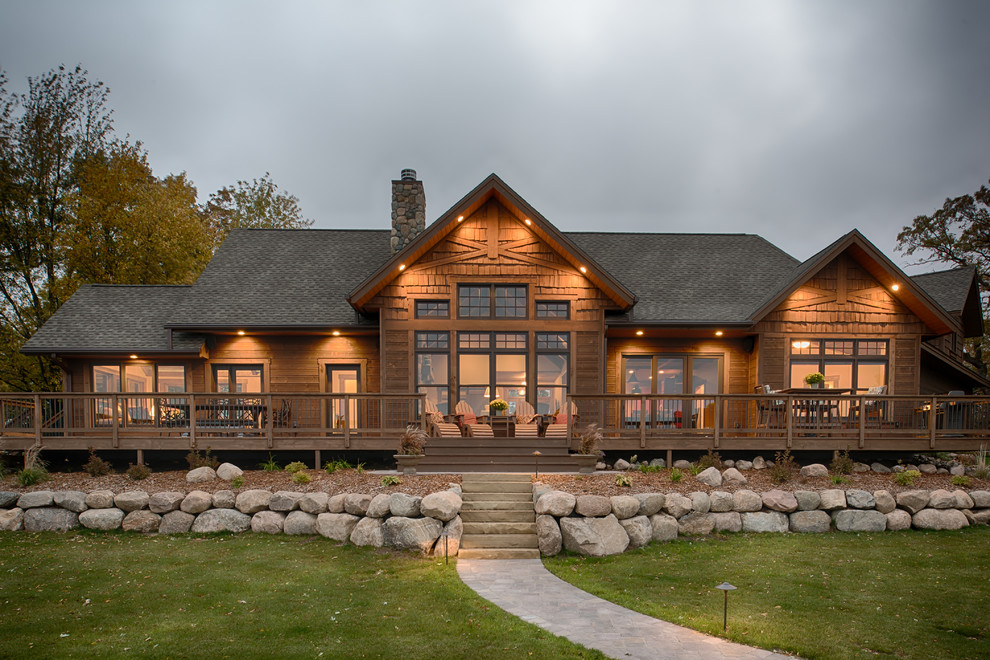 Large rustic brown one-story wood gable roof idea in Minneapolis