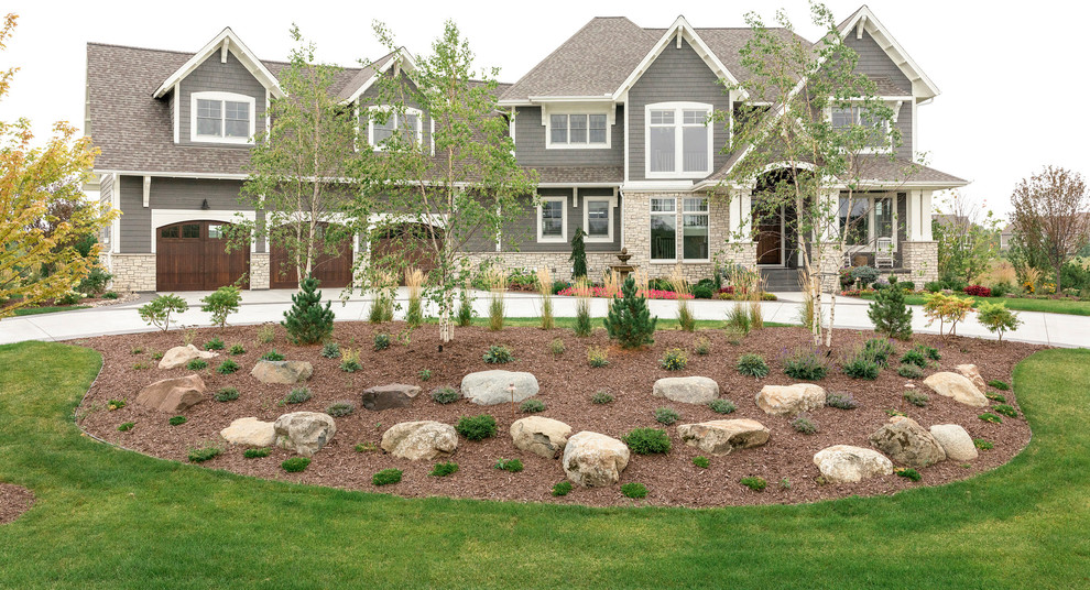Inspiration for a large coastal three-story house exterior remodel in Minneapolis