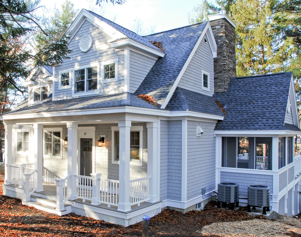 Mid-sized craftsman gray two-story wood exterior home idea in Boston with a shingle roof