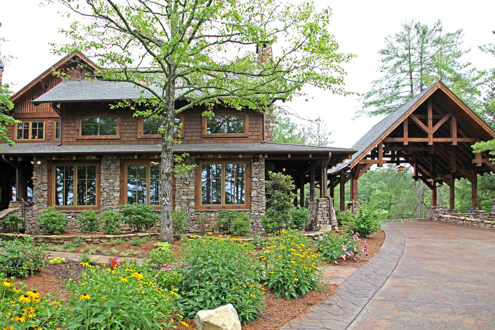 Inspiration for a large rustic brown two-story wood exterior home remodel in Atlanta