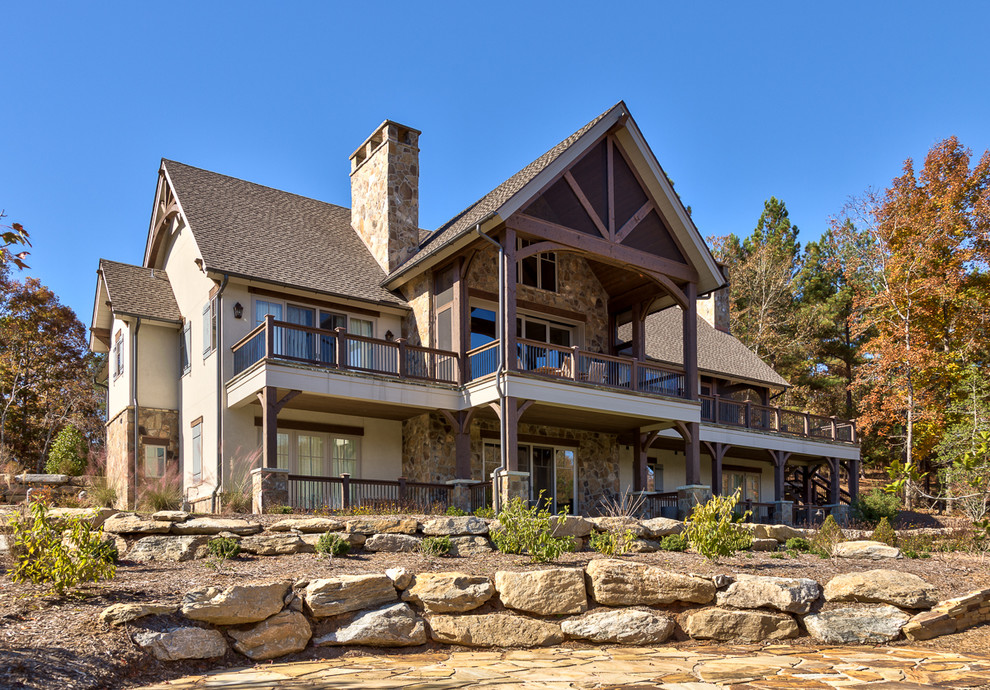 Example of a mountain style two-story exterior home design in Other