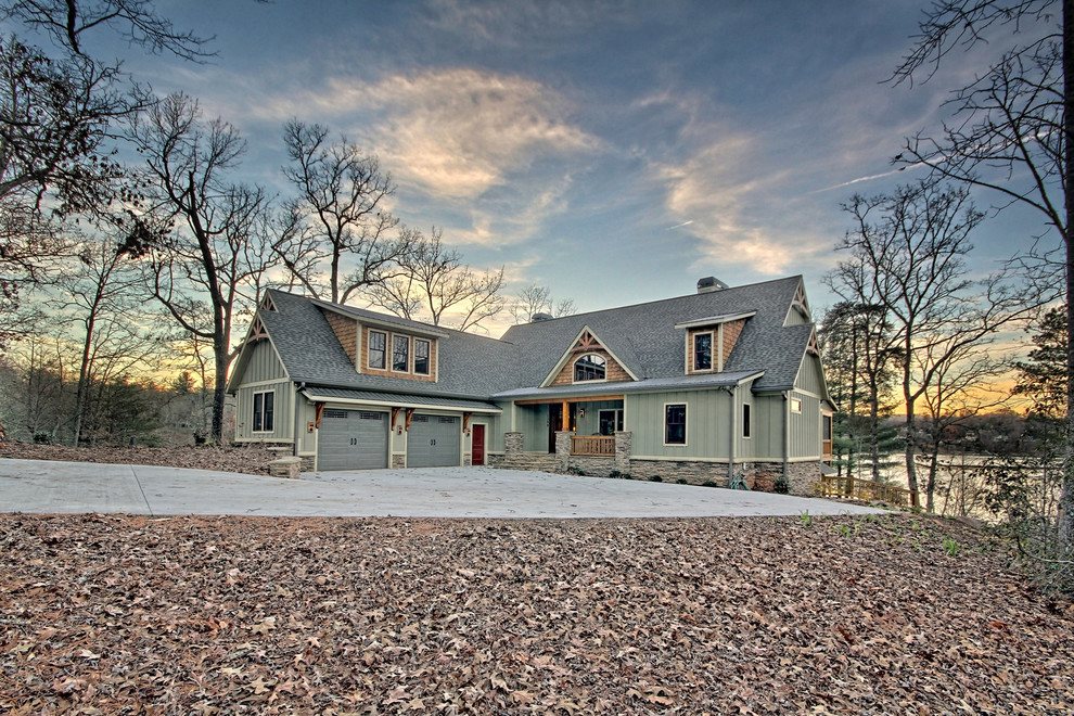 This is an example of a green classic house exterior in Atlanta with concrete fibreboard cladding.