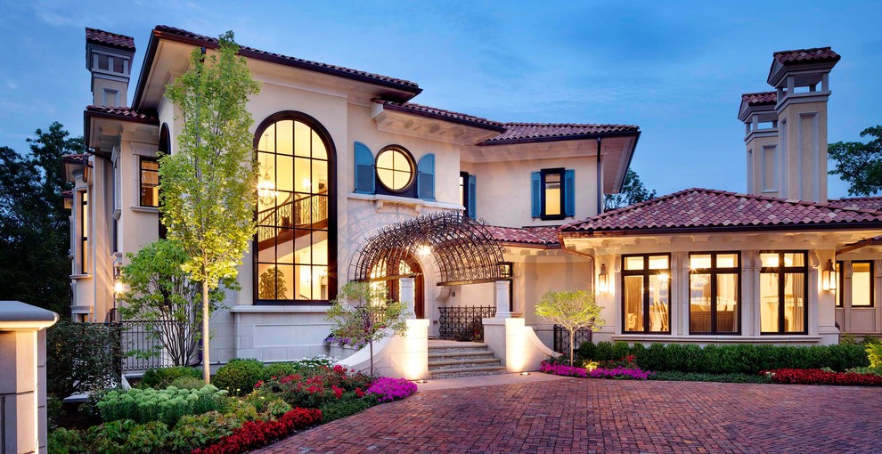 Example of a tuscan exterior home design in Chicago