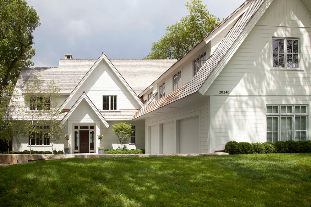 Transitional white wood gable roof idea in Minneapolis