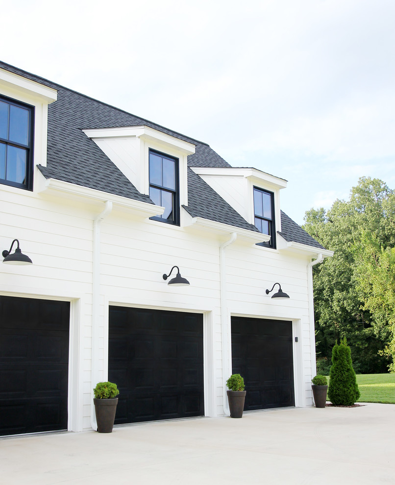 Mid-sized country white two-story concrete fiberboard exterior home idea in Other with a mixed material roof