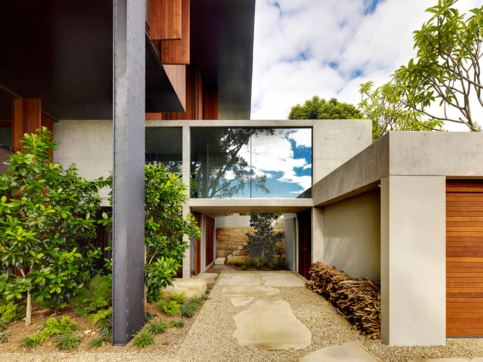 Photo of a modern concrete house exterior in Sydney.