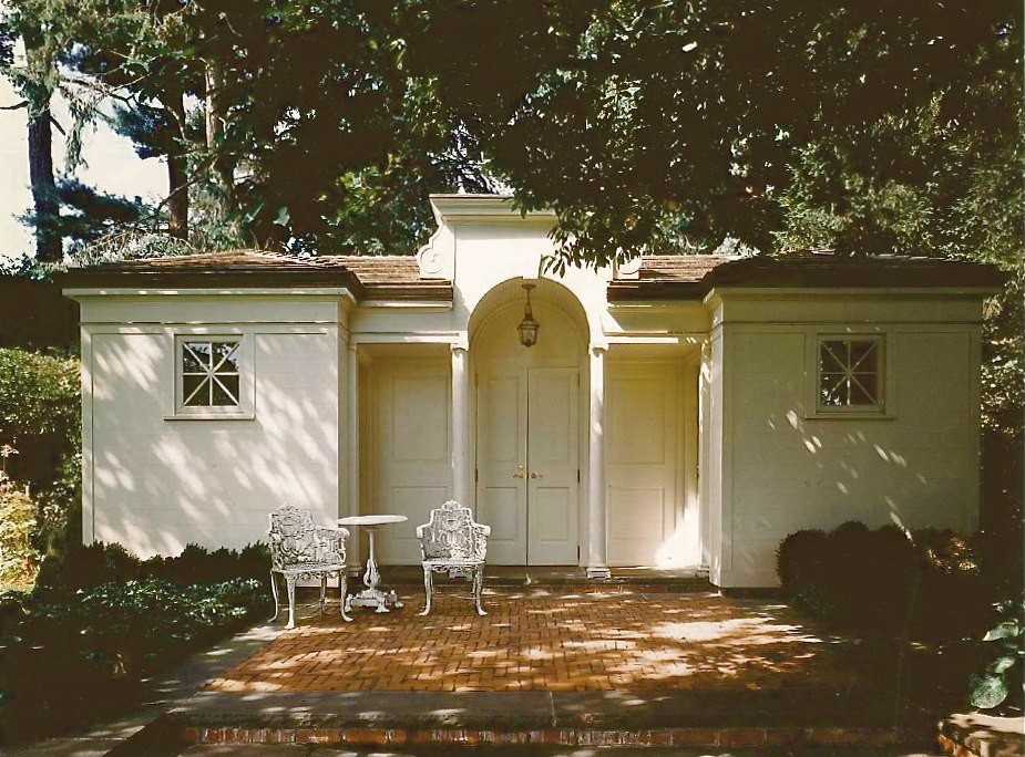 Design ideas for a small and white bohemian bungalow house exterior in New York with a hip roof.