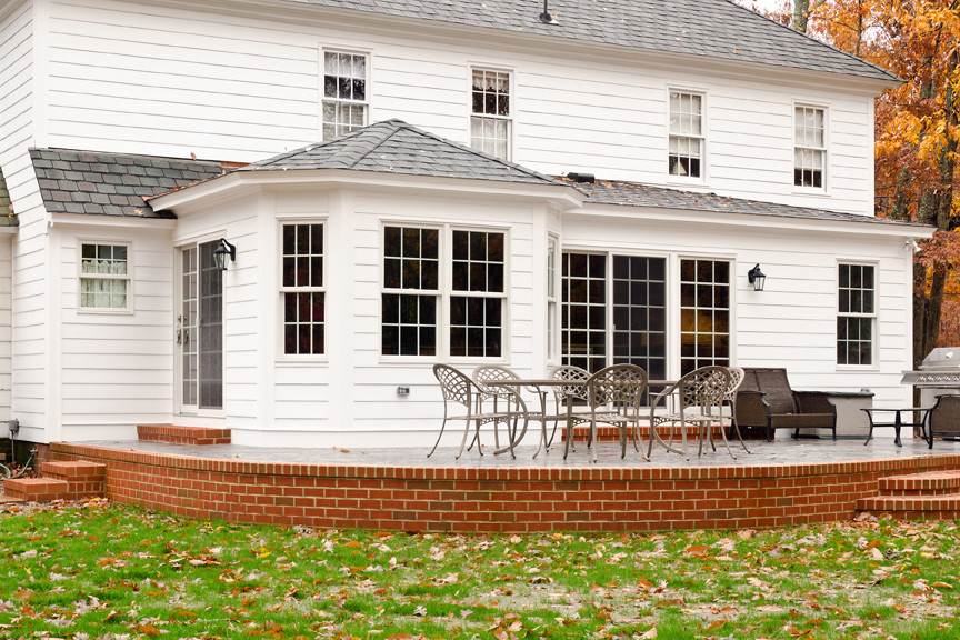 Design ideas for a traditional house exterior in Richmond.