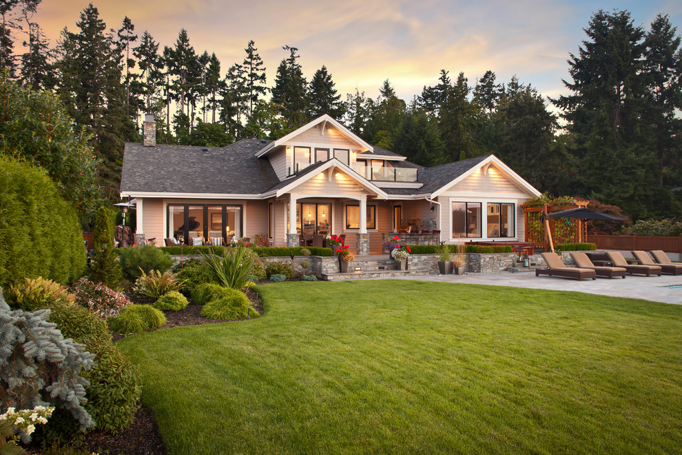 Inspiration for a mid-sized timeless two-story exterior home remodel in Vancouver