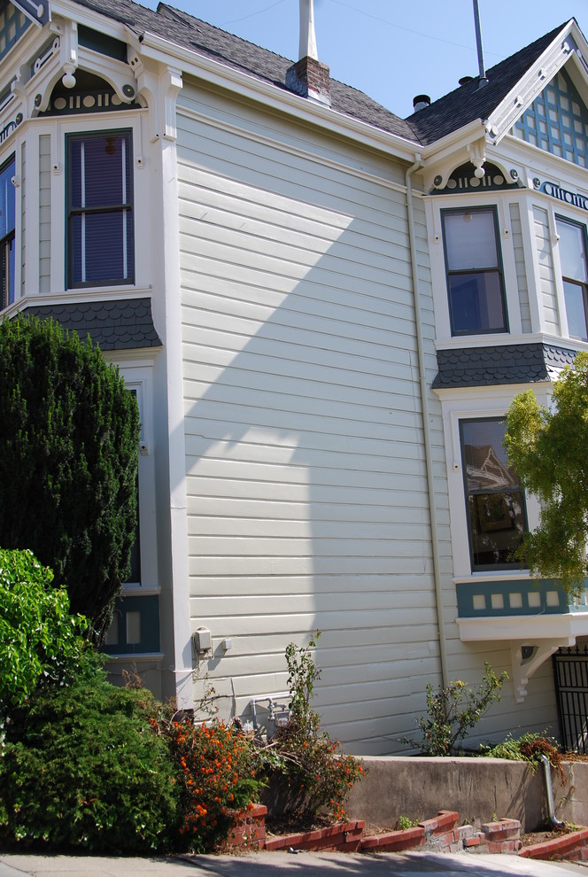 Design ideas for a beige victorian two floor house exterior in San Francisco.