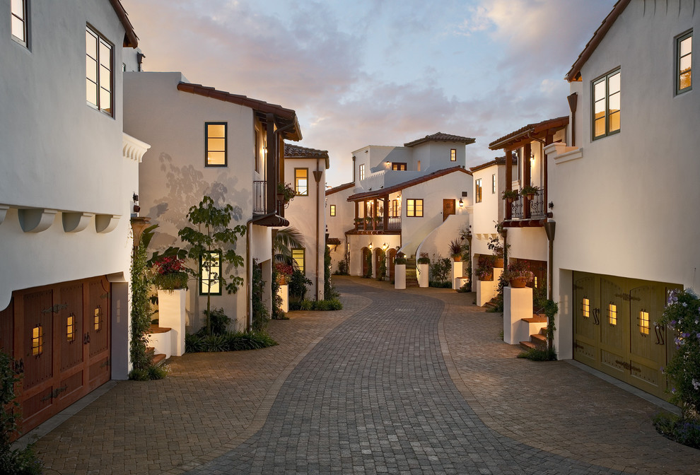 Example of a tuscan three-story exterior home design in Santa Barbara