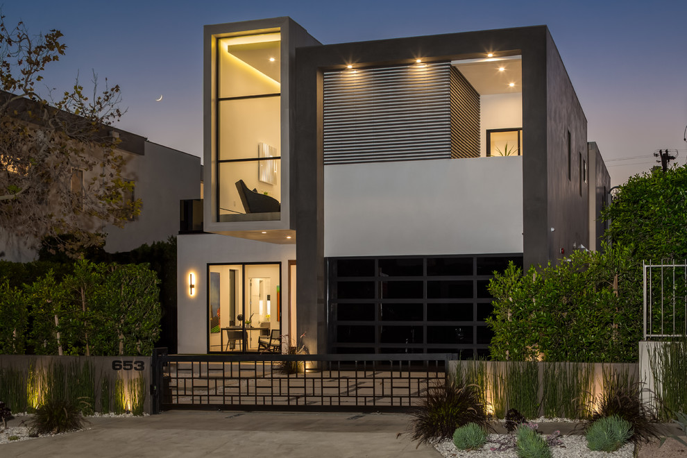 Trendy gray two-story exterior home photo in Los Angeles