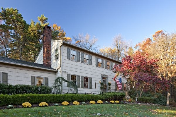 Elegant beige two-story exterior home photo in Minneapolis