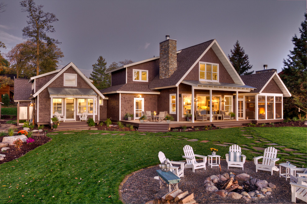 Mid-sized traditional gray two-story wood exterior home idea in Minneapolis with a shingle roof