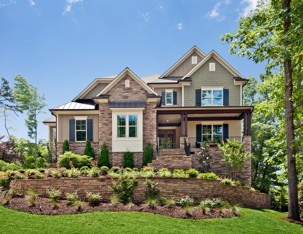 Example of a classic brick exterior home design in Raleigh