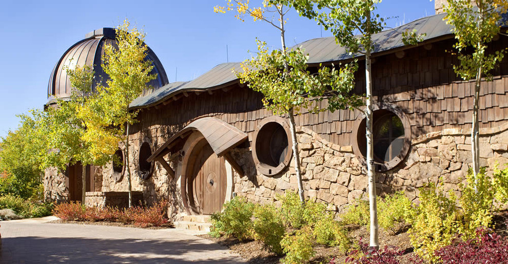 This is an example of a rustic house exterior in Denver.
