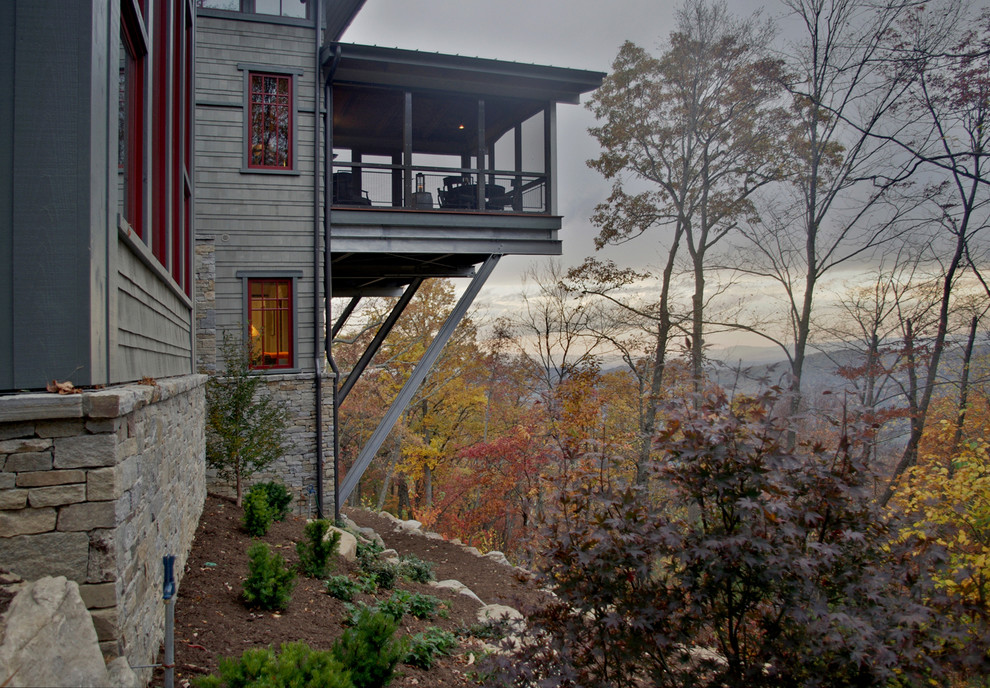 Large craftsman gray two-story mixed siding exterior home idea in Charlotte with a hip roof