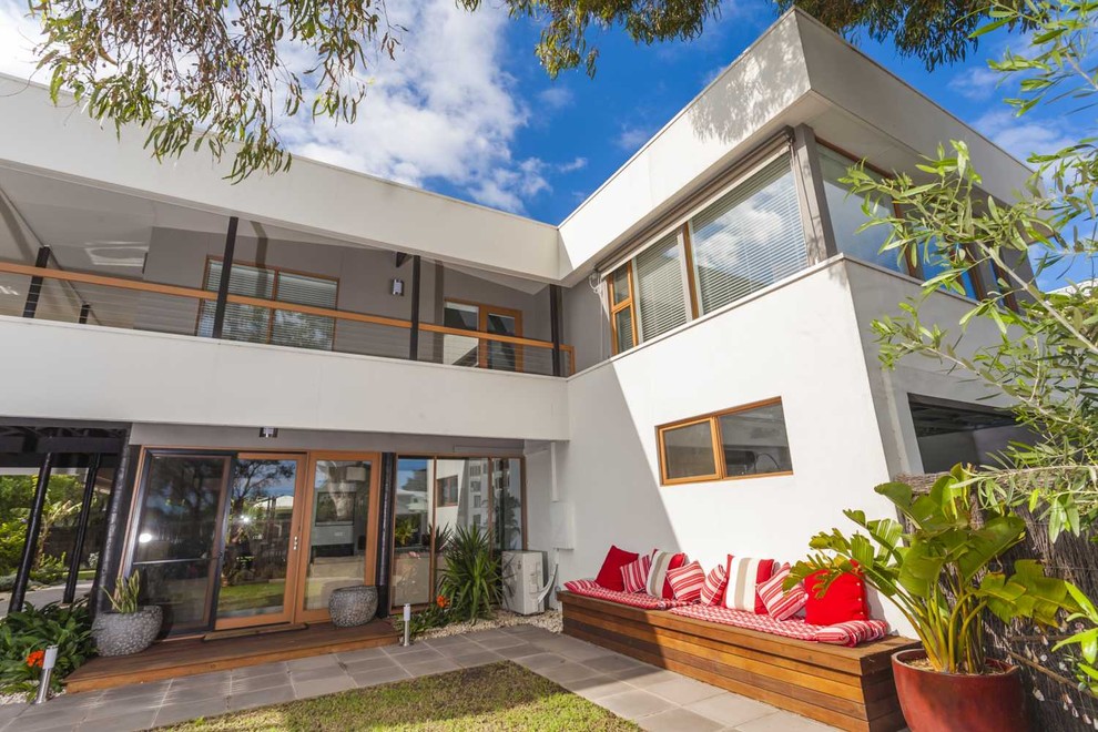 Mid-sized 1950s white two-story exterior home photo in Melbourne