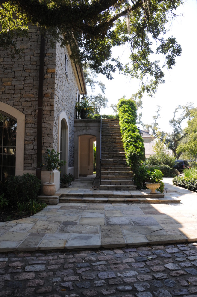 Classic house exterior in New Orleans with stone cladding.
