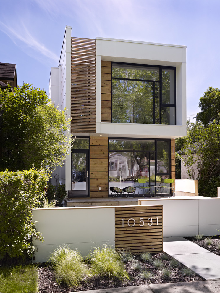 Inspiration for a modern wood exterior home remodel in Edmonton