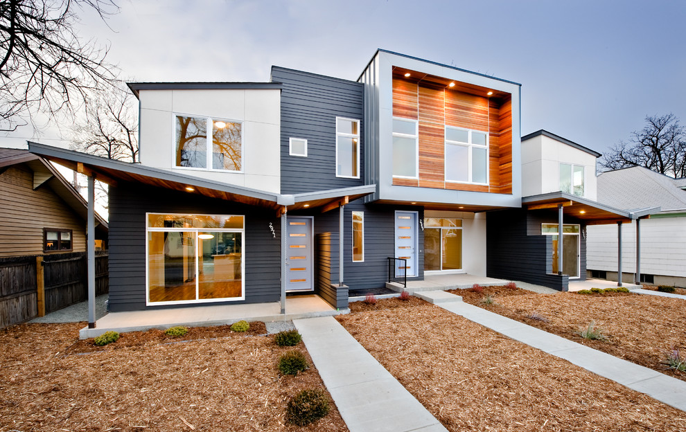 Example of a mid-sized minimalist black two-story mixed siding exterior home design in Denver