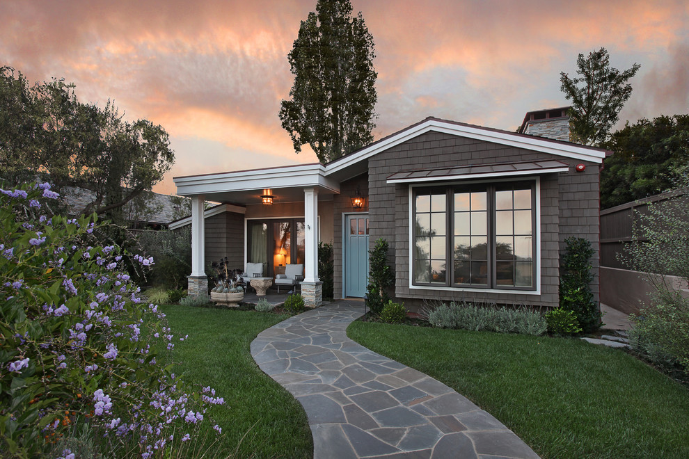 Inspiration for a small timeless gray one-story wood gable roof remodel in Orange County