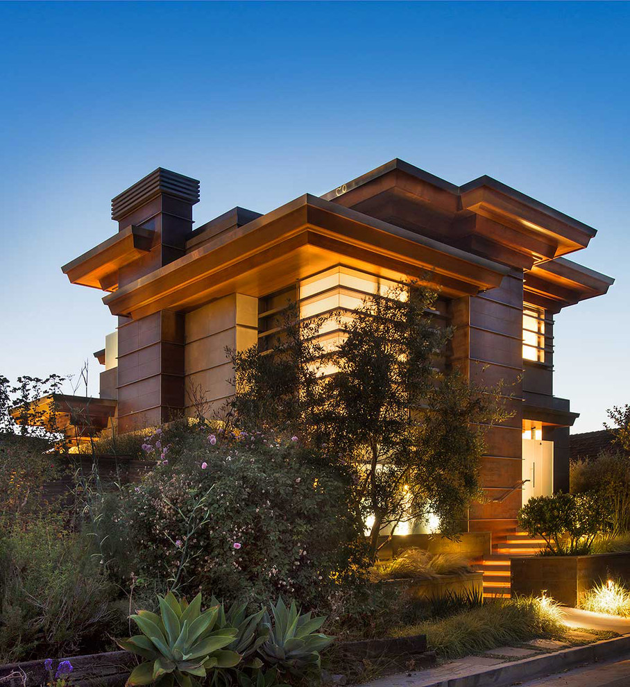 Design ideas for a contemporary house exterior in San Diego with three floors and a flat roof.