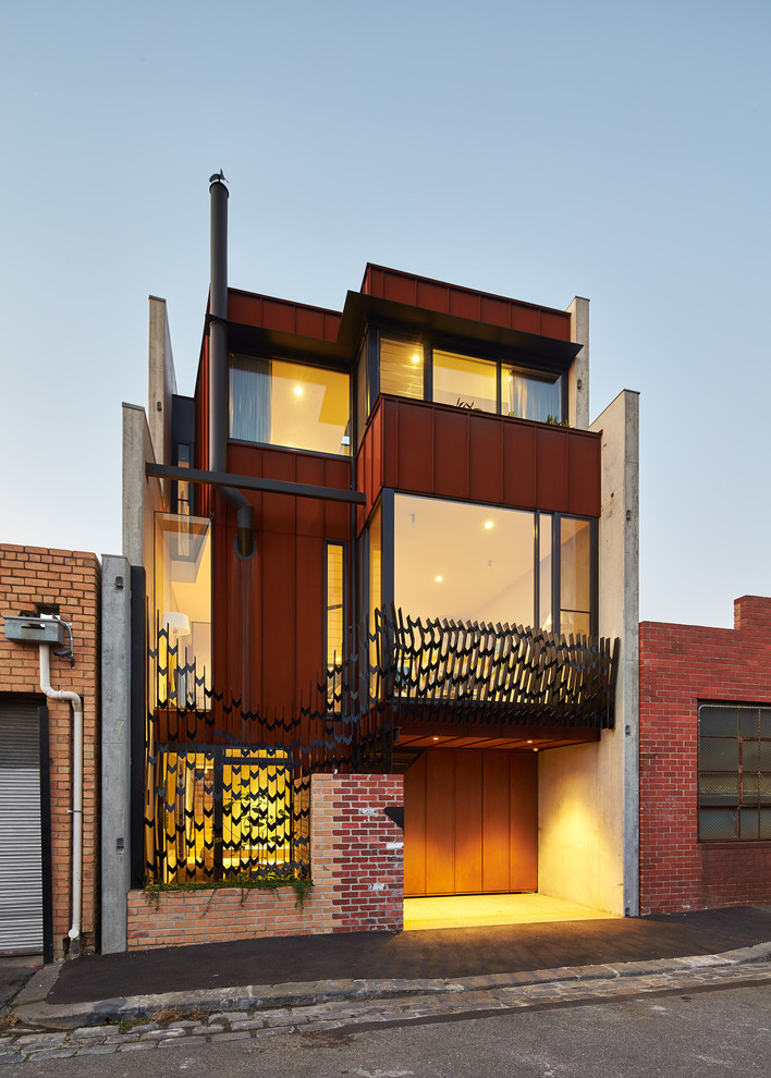 Design ideas for a large urban house exterior in Melbourne with three floors.