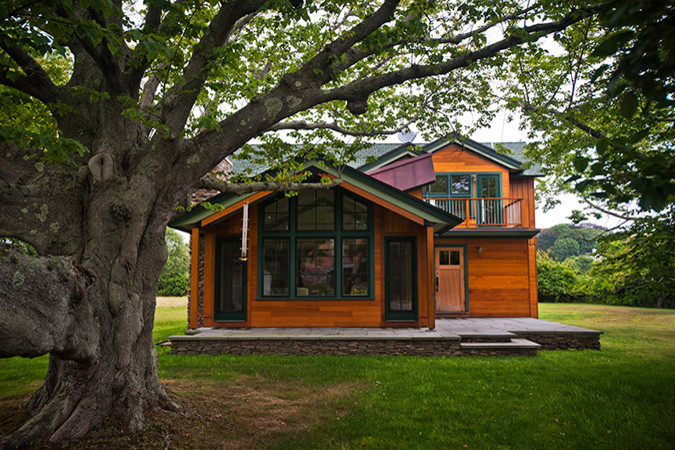 Medium sized contemporary two floor house exterior in Boston with wood cladding.