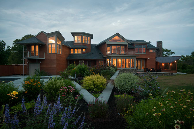 Inspiration for a large timeless three-story wood exterior home remodel in Boston