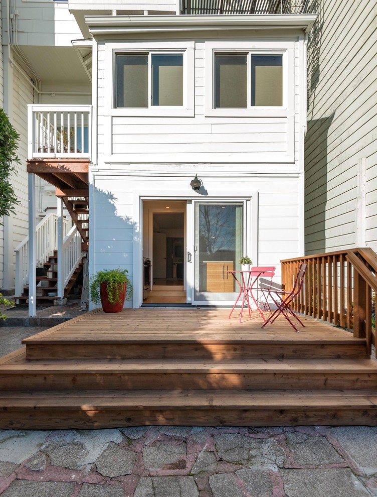 Example of a small minimalist white one-story wood exterior home design in San Francisco
