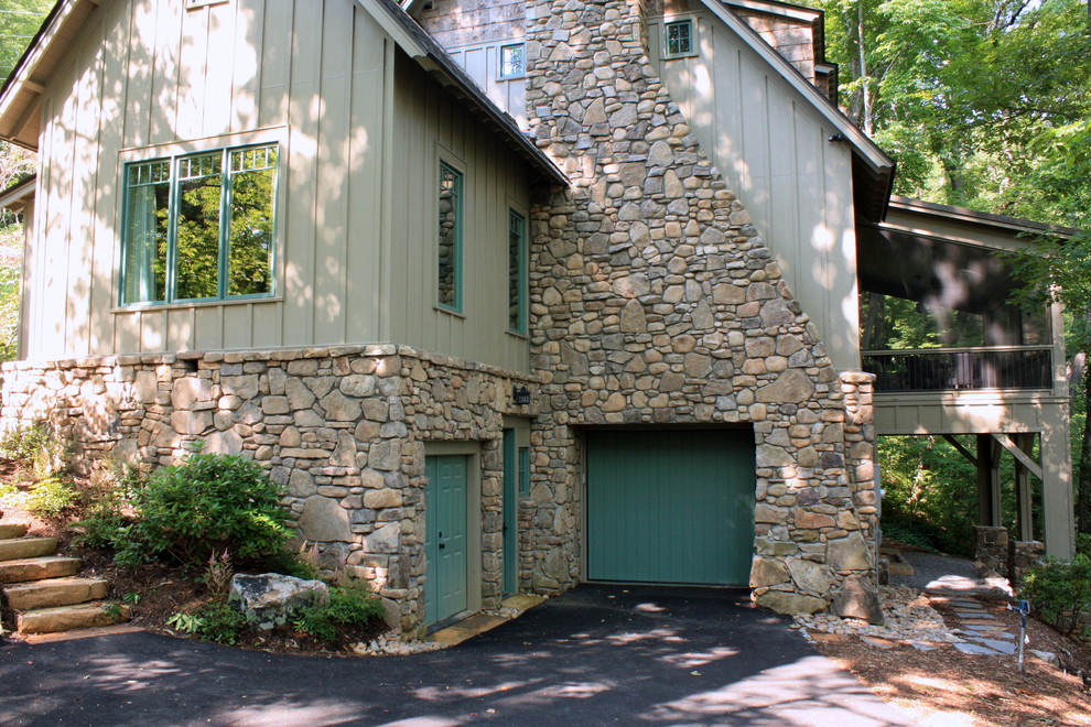 This is an example of a classic house exterior in Other with stone cladding.
