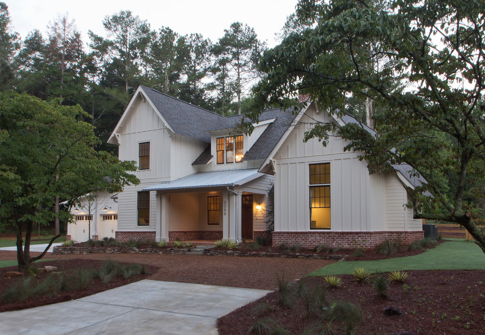 Mid-sized cottage white two-story wood exterior home photo in Atlanta with a shingle roof
