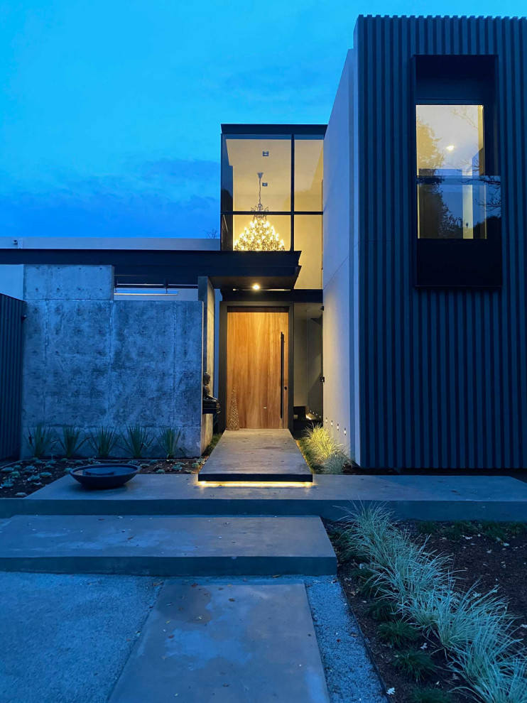 Large and gey contemporary two floor detached house in San Francisco with mixed cladding, a flat roof and a metal roof.