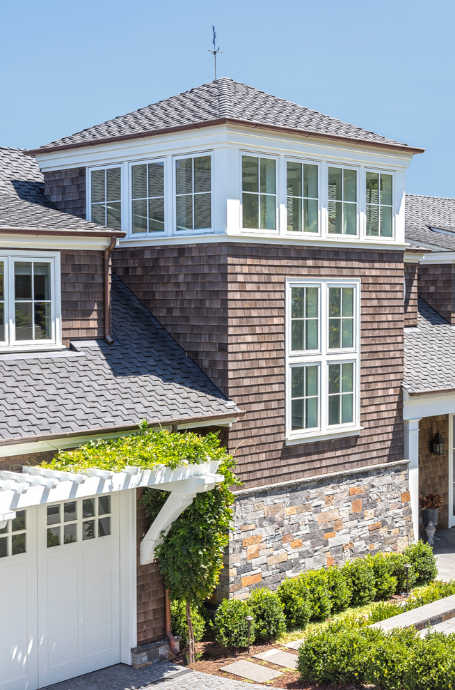 Large traditional brown three-story mixed siding exterior home idea in San Francisco with a shingle roof
